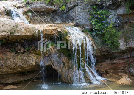 Waterfall in Catalonia surrounded by beautiful forests 46558174
