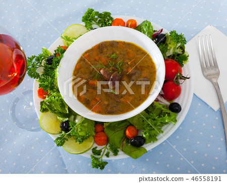 Delicious chicken hearts stew 46558191