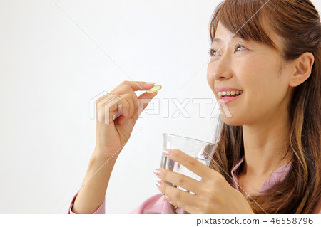 A woman with medicine A woman with medicine 46558796