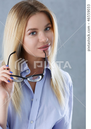 Portrait of a sexy woman in a man's shirt Portrait of a sexy woman in a man's shirt 46559033