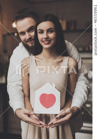 Portrait smiling couple in love standing embracing Portrait smiling couple in love standing embracing 46559961