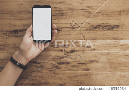 Top view of hands holding tablet table background 46559984