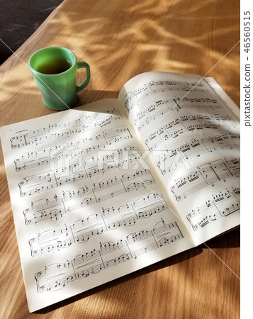 Sheet music and drinks Sheet music and drinks 46560515