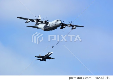 United States Marine Corps KC-130J air refueling aircraft and FA-18D fighter attack aircraft 46561010