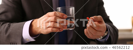 Adult male businessman hold tablet on Adult male businessman hold tablet on 46562212
