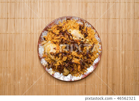 Traditional Indian chicken Biryani with nuts. Traditional Indian chicken Biryani with nuts. 46562321