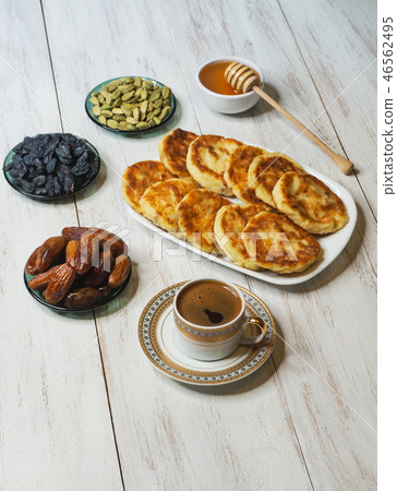 Msabeeb is a flatbread. Arabic dessert with honey. Msabeeb is a flatbread. Arabic dessert with honey. 46562495