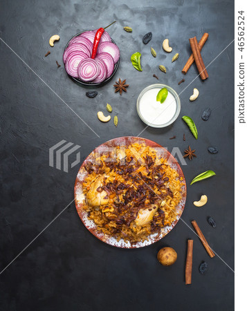 Chicken Kabsa - Arabian Biryani on the black table Chicken Kabsa - Arabian Biryani on the black table 46562524