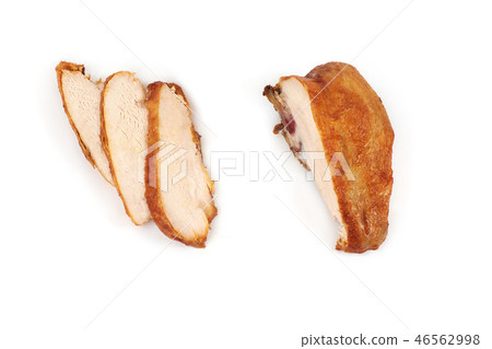 A close up of grilled, sliced chicken breast isolated on white background . A close up of grilled, sliced chicken breast isolated on white background . 46562998