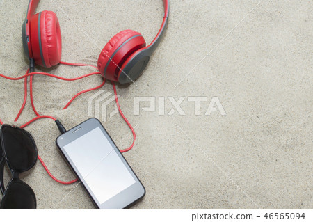 phone with headphones and sunglasses phone with headphones and sunglasses 46565094