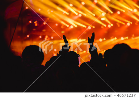 hands of people at the concert 46571237