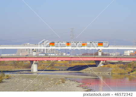 Tama city monorail seen from Hino Bridge 46572342