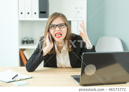 Stress, office, hysteric, people concept - aggressive woman with a lot of work in office Stress, office, hysteric, people concept - aggressive woman with a lot of work in office 46573772