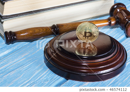 judge's hammer and bitcoin gold coin.  46574112