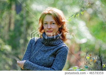 Portrait of woman in nature 46578359