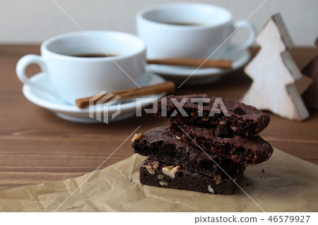 Chocolate brownie cookies placed on wood table 46579927