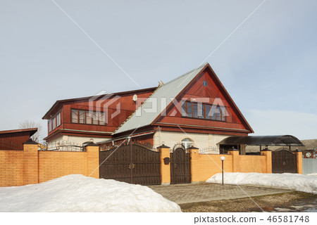 Brick cottage, early spring time 46581748