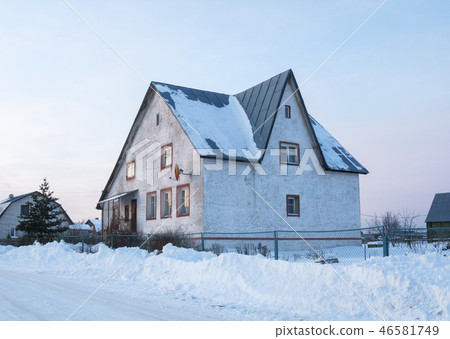 Concrete cottage in winter time 46581749