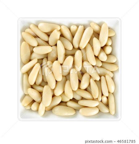 Pine nuts in square bowl Pine nuts in square bowl 46581785
