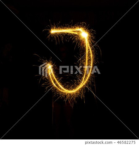 Alphabet sparklers on black background single letter Alphabet sparklers on black background single letter 46582275