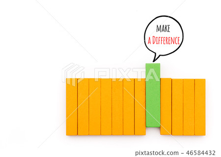 green wooden block arrange with make a difference 46584432