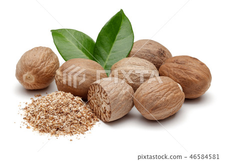 Nutmeg and leaves isolated on white background Nutmeg and leaves isolated on white background 46584581