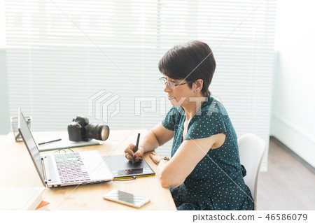 Office, graphic designer concept - Business woman hands holding digital tablet, drawing the sketch Office, graphic designer concept - Business woman hands holding digital tablet, drawing the sketch 46586079