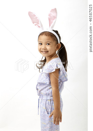 Girl acting as a little easter day 46587025