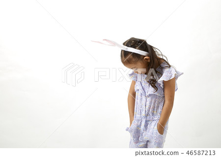 Girl acting as a little easter day 46587213
