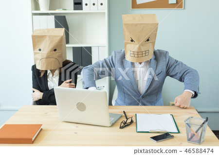 Business, emotions and people concept - woman and man wearing the packages on their heads with Business, emotions and people concept - woman and man wearing the packages on their heads with 46588474