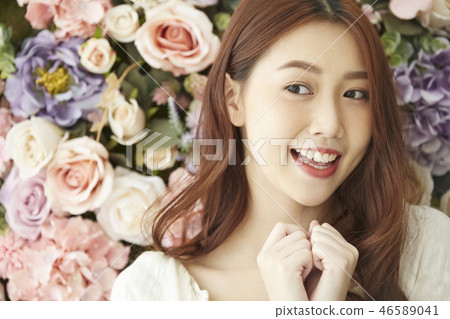 Flower and woman portrait 46589041