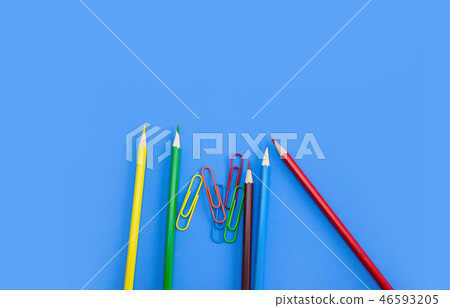 School stationery pencils clips on blue background School stationery pencils clips on blue background 46593205