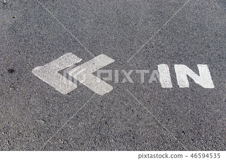 White painitng in arrow shape with word in White painitng in arrow shape with word in 46594535