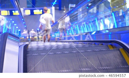 long escalators in modern mall, blur background 46594557