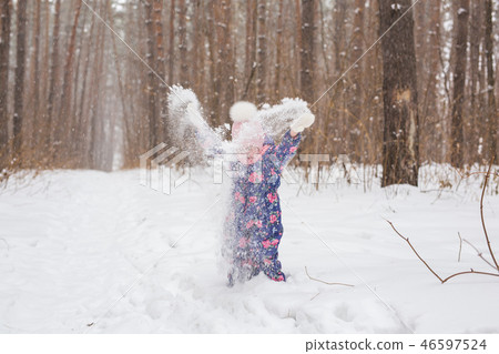 Family and nature concept - Beautiful little girl playng in the park 46597524
