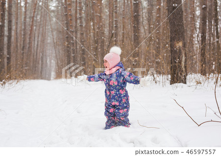 Family and nature concept - Beautiful little girl playng in the park 46597557