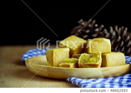 Chinese cakes dice shaped and dry pine flower. 46602685