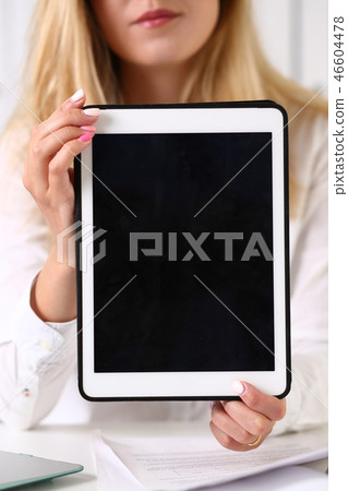 Beautiful businesswoman wearing glasses Beautiful businesswoman wearing glasses 46604478