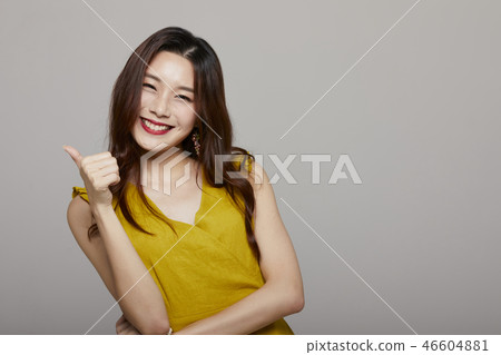 Woman portrait series color back hand sign 46604881