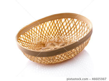 Basket wicker on isolated white background Basket wicker on isolated white background 46605987