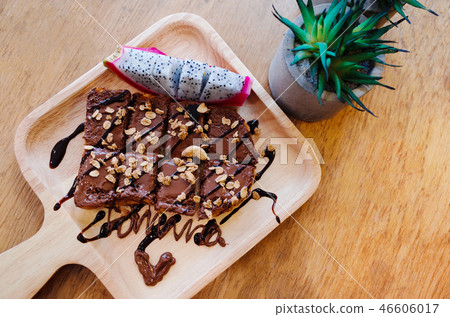 Chocolat bread slice shot on rustic wooden table Chocolat bread slice shot on rustic wooden table 46606017