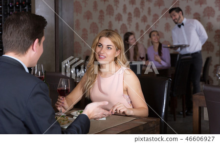girl with boyfriend enjoying evening meal girl with boyfriend enjoying evening meal 46606927