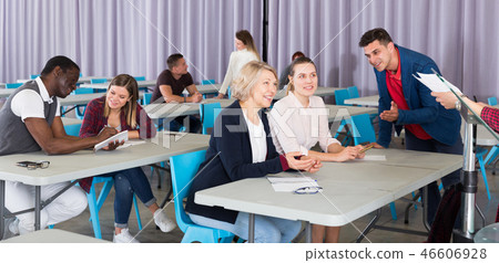 Adult people communicating in classroom Adult people communicating in classroom 46606928