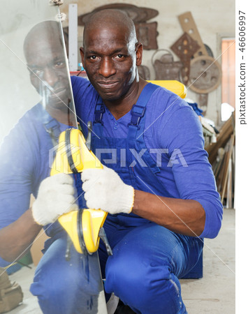 Workman working with glass Workman working with glass 46606997