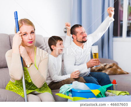 Tired woman with relaxing man with boy Tired woman with relaxing man with boy 46607603