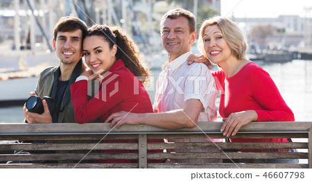 Tourists relaxing on sea front 46607798