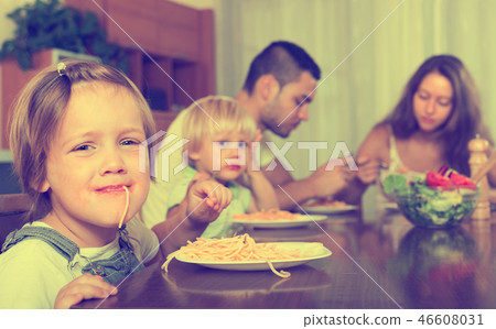 Family eating spaghetti Family eating spaghetti 46608031