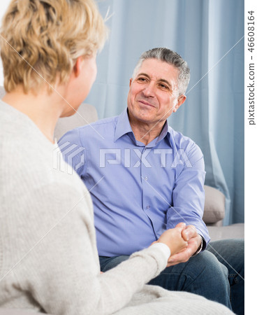 married couple in house are warmly reconciled after quarrel married couple in house are warmly reconciled after quarrel 46608164