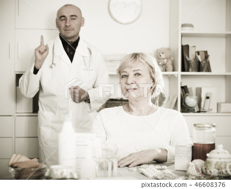 MAture woman and doctor MAture woman and doctor 46608376