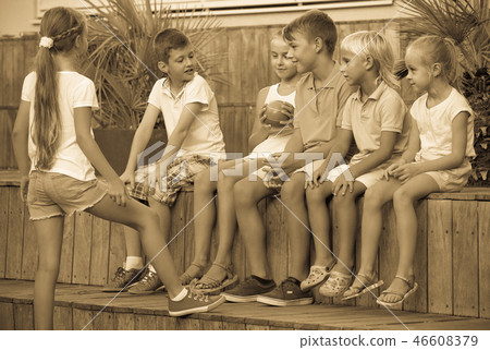 kids playing ball together 46608379
